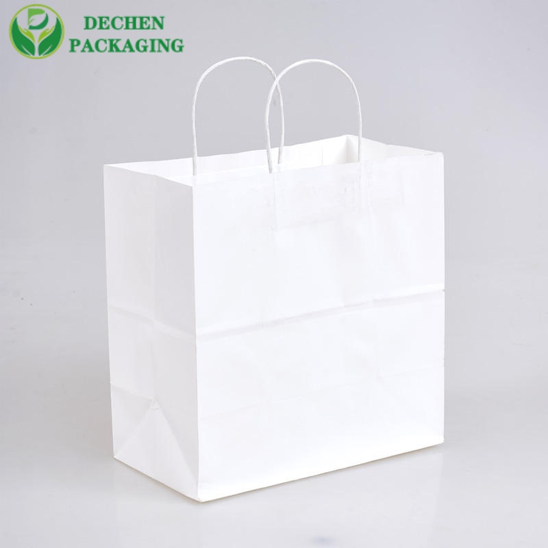 Sacs en papier bleu avec poignées pour la vente au détail
